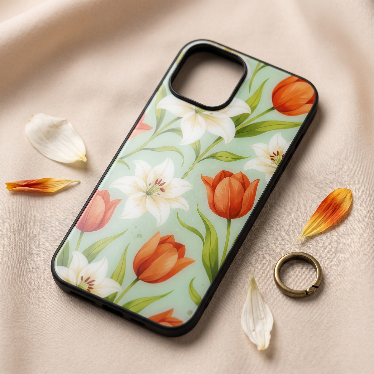 Close-up of tulip and lily floral phone cover showing glossy print and black camera rim