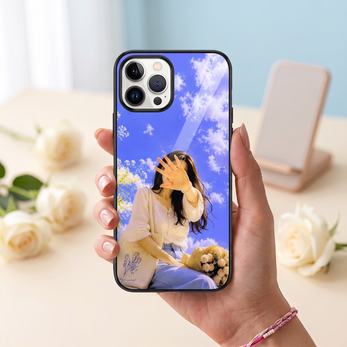 Kase Culture customised phone cover with girl in blue sky and clouds print held in hand