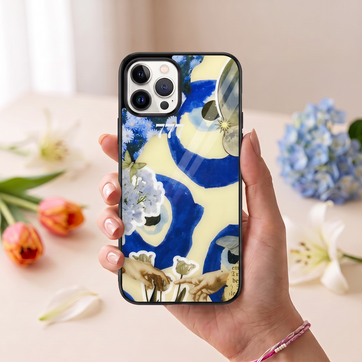 Kase Culture customised phone cover with 777 blue and yellow aesthetic collage print held in hand